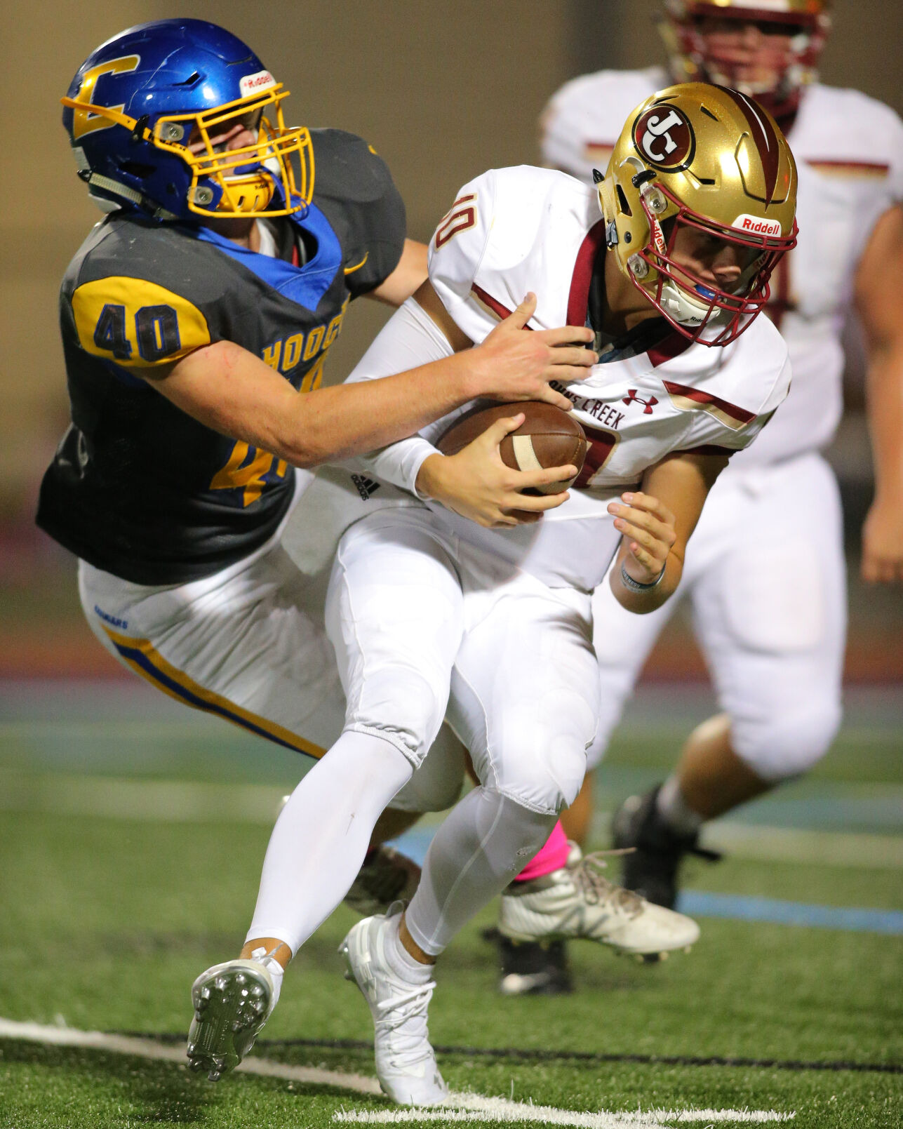 ON THE COVER | Chattahoochee and Johns Creek rivalry game